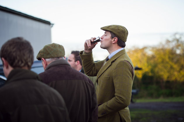 man drinking sloe gin