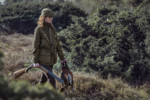 Female Gun with pheasant